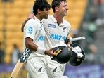 New Zealand's Will Young (R) and Rachin Ravindra celebrate their team's win against India at the end of their first Test cricket match in the M. Chinnaswamy Stadium. New Zealand's Will Young (R) and Rachin Ravindra celebrate their team's win against India at the end of their first Test cricket match in the M. Chinnaswamy Stadium.