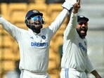 India's captain Rohit Sharma (R) and wicketkeeper Rishabh Pant unsuccessfully appeal for leg before wicket (LBW) against New Zealand's captain Tom Latham during the second day of the first Test cricket match between India and New Zealand at the M. Chinnaswamy Stadium in Bengaluru on October 17, 2024. (Photo by IDREES MOHAMMED / AFP) / -- IMAGE RESTRICTED TO EDITORIAL USE - STRICTLY NO COMMERCIAL USE -- India's captain Rohit Sharma (R) and wicketkeeper Rishabh Pant unsuccessfully appeal for leg before wicket (LBW) against New Zealand's captain Tom Latham during the second day of the first Test cricket match between India and New Zealand at the M. Chinnaswamy Stadium in Bengaluru on October 17, 2024. (Photo by IDREES MOHAMMED / AFP) / -- IMAGE RESTRICTED TO EDITORIAL USE - STRICTLY NO COMMERCIAL USE --