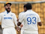 India's Jasprit Bumrah, right, celebrates with teammate Virat Kohli after the dismissal of New Zealand's captain Tom Latham during the day five of the first cricket test match between India and New Zealand at the M.Chinnaswamy Stadium, in Bengaluru, India, Sunday, Oct. 20, 2024. (AP Photo/Aijaz Rahi) India's Jasprit Bumrah, right, celebrates with teammate Virat Kohli after the dismissal of New Zealand's captain Tom Latham during the day five of the first cricket test match between India and New Zealand at the M.Chinnaswamy Stadium, in Bengaluru, India, Sunday, Oct. 20, 2024. (AP Photo/Aijaz Rahi)