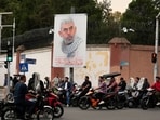 Motorbikes drive past a banner of Hamas leader Yahya Sinwar, who was killed by Israeli forces in Gaza on Wednesday, in front of the British Embassy in downtown Tehran, Iran, Saturday, Oct. 19, 2024. (AP Photo/Vahid Salemi)