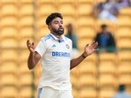 India's Mohammed Siraj reacts during the fifth day of the first test cricket match against New Zealand. India's Mohammed Siraj reacts during the fifth day of the first test cricket match against New Zealand.