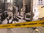 Police personnel investigate at the spot after two groups of people opened fire, at Welcome area in New Delhi, Saturday, Oct. 19, 2024. One woman suffered injuries in the incident.