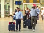 Chandigarh: Passengers of the IndiGo flight that received a bomb threat come out of the Chandigarh airport, Saturday, Oct. 19, 2024.