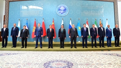 In this photo released by the Press Information Department, Pakistan's Prime Minister Shehbaz Sharif, center, China's Premier Li Qiang, fifth left, Belarus Prime Minister Roman Golovchenko, fourth left, Russian Prime Minister Mikhail Mishustin, sixth right, Kazakhstan's Prime Minister Olzhas Bektenov, fifth right, Tajikistan's Prime Minister Kokhir Rasulzoda, fourth right, and other leaders pose for group photo at the opening session of Shanghai Cooperation Organization (SCO) meeting in Islamabad, Pakistan, Wednesday, Oct. 16, 2024. AP/PTI(AP10_16_2024_000072B) (AP)