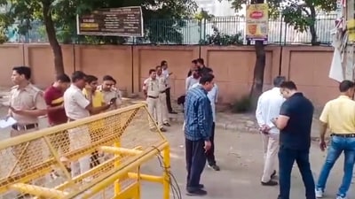 Police personnel keep vigil after a blast was reported at Prashant Vihar, near CRPF school in New Delhi, (PTI) Police personnel keep vigil after a blast was reported at Prashant Vihar, near CRPF school in New Delhi, (PTI)