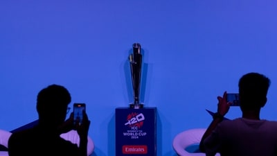 Media persons take photographs of Women's T20 Cricket World Cup trophy. (AP) Media persons take photographs of Women's T20 Cricket World Cup trophy. (AP)
