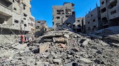 Palestinians gather at the site of Israeli strikes on houses and residential buildings, amid the ongoing Israel-Hamas conflict, in Beit Lahiya, in the northern Gaza Strip October 20, 2024. (REUTERS)