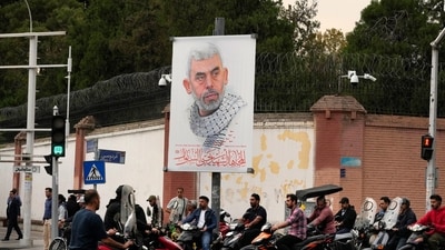 Motorbikes drive past a banner of Hamas leader Yahya Sinwar, who was killed by Israeli forces in Gaza on Wednesday, in front of the British Embassy in downtown Tehran, Iran, Saturday, Oct. 19, 2024. (AP Photo/Vahid Salemi) (AP) Motorbikes drive past a banner of Hamas leader Yahya Sinwar, who was killed by Israeli forces in Gaza on Wednesday, in front of the British Embassy in downtown Tehran, Iran, Saturday, Oct. 19, 2024. (AP Photo/Vahid Salemi) (AP)