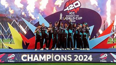 New Zealand's Sophie Devine lifts the trophy as she celebrates with teammates after winning the Women's T20 World Cup in Dubai. (REUTERS) New Zealand's Sophie Devine lifts the trophy as she celebrates with teammates after winning the Women's T20 World Cup in Dubai. (REUTERS)