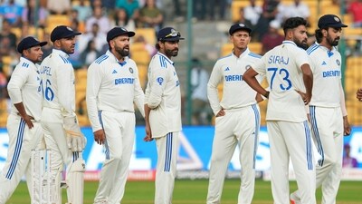 Bengaluru: India�s captain Rohit Sharma and others on the ground after bad light stopped play on the fourth day of the first test cricket match between India and New Zealand, at the M Chinnaswamy Stadium, in Bengaluru, Saturday, Oct. 19, 2024. (PTI Photo/Shailendra Bhojak) (PTI10_19_2024_000339B) (PTI) Bengaluru: India�s captain Rohit Sharma and others on the ground after bad light stopped play on the fourth day of the first test cricket match between India and New Zealand, at the M Chinnaswamy Stadium, in Bengaluru, Saturday, Oct. 19, 2024. (PTI Photo/Shailendra Bhojak) (PTI10_19_2024_000339B) (PTI)