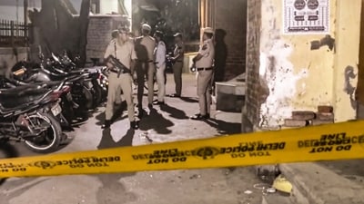 Police personnel investigate at the spot after two groups of people opened fire, at Welcome area in New Delhi, Saturday, Oct. 19, 2024. One woman suffered injuries in the incident. (PTI) Police personnel investigate at the spot after two groups of people opened fire, at Welcome area in New Delhi, Saturday, Oct. 19, 2024. One woman suffered injuries in the incident. (PTI)