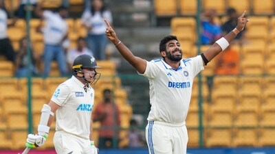 New Zealand needed to chase down a target of 107 to win the match, having dismissed India for scores of 46 and 462 and themselves scoring 402 in their first innings. However, Jasprit Bumrah gave the crowd at the Chinnaswamy Stadium a reason to cheer as he dismissed New Zealand captain Tom Latham off just his second delivery of the day. (PTI) New Zealand needed to chase down a target of 107 to win the match, having dismissed India for scores of 46 and 462 and themselves scoring 402 in their first innings. However, Jasprit Bumrah gave the crowd at the Chinnaswamy Stadium a reason to cheer as he dismissed New Zealand captain Tom Latham off just his second delivery of the day. (PTI)