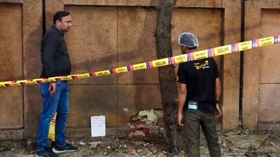 New Delhi: Forensic team collects samples from the site where a blast took place. (PTI) New Delhi: Forensic team collects samples from the site where a blast took place. (PTI)