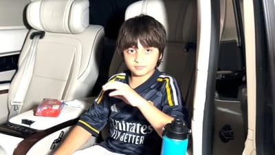AbRam waved at the paparazzi and smiled at them. AbRam waved at the paparazzi and smiled at them.