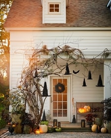 Infuse your space with a voodoo-esque atmosphere by hanging witch hats from the ceiling or outdoor spaces. Infuse your space with a voodoo-esque atmosphere by hanging witch hats from the ceiling or outdoor spaces.