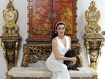 Shalini Passi poses inside her art-filled Delhi home.