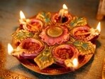 Diwali is celebrated with diyas and rangoli. Meanwhile, a Halloween classic is the jack-o'-lantern made using the spooky carved pumpkin. (Pics: Pexels)
