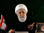 An image grab taken from Hezbollah's Al-Manar TV shows the group's deputy chief Naim Qassem delivering a speech from an undisclosed location on October 15, 2024.