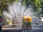 An anti-smog gun being used to spray water droplets to curb air pollution, in New Delhi, Friday, Oct. 18.