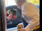 Trump interacts with the public while working at McDonald's