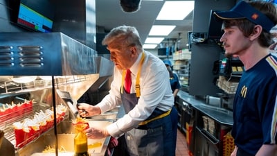 Donald Trump, left, uses a frier as an employee looks on during a visit to McDonald's in Feasterville-Trevose, Pa., Sunday, Oct. 20, 2024. (Doug Mills/The New York Times via AP, Pool) (AP) Donald Trump, left, uses a frier as an employee looks on during a visit to McDonald's in Feasterville-Trevose, Pa., Sunday, Oct. 20, 2024. (Doug Mills/The New York Times via AP, Pool) (AP)