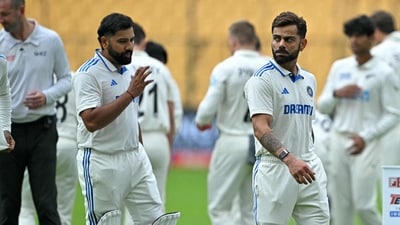 India's Virat Kohli (C) and captain Rohit Sharma (2L) walk across the field before the start of the second day play of the first Test cricket match between India and New Zealand at the M. Chinnaswamy Stadium in Bengaluru on October 17 (AFP) India's Virat Kohli (C) and captain Rohit Sharma (2L) walk across the field before the start of the second day play of the first Test cricket match between India and New Zealand at the M. Chinnaswamy Stadium in Bengaluru on October 17 (AFP)