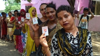 Voters show their ID cards before casting their ballot. (HT Photo)