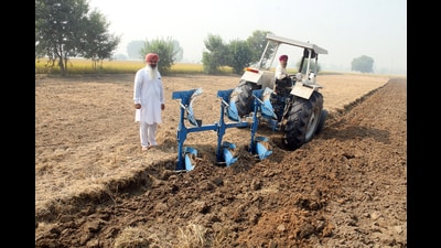 Farmer Sukhpal Singh at his farm which is being prepared for potato sowing after managing paddy stubble on the field in Gobindpura village, Bathinda on Sunday. (Sanjeev Kumar/Hindustan Times) Farmer Sukhpal Singh at his farm which is being prepared for potato sowing after managing paddy stubble on the field in Gobindpura village, Bathinda on Sunday. (Sanjeev Kumar/Hindustan Times)