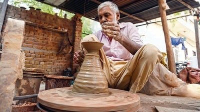 This potter in Gurugram is making almost five thousand diyas everyday ahead of Diwali. (Photo: Parveen Kumar/HT)