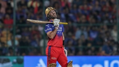 Royal Challengers Bengaluru's Glenn Maxwell reacts after being dismissed by Gujarat Titans' Joshua Little (AP) Royal Challengers Bengaluru's Glenn Maxwell reacts after being dismissed by Gujarat Titans' Joshua Little (AP)