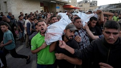Palestinians mourn as they carry the bodies of relatives killed in the Israeli bombardment of the Gaza Strip at a hospital in Deir el-Balah, Sunday, Oct. 20, 2024. (AP) Palestinians mourn as they carry the bodies of relatives killed in the Israeli bombardment of the Gaza Strip at a hospital in Deir el-Balah, Sunday, Oct. 20, 2024. (AP)