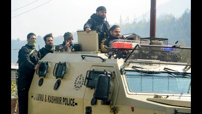 J&K police personnel during a search operation on Srinagar-Ladakh highway following a terrorist attack in Ganderbal district, on Monday. (PTI)