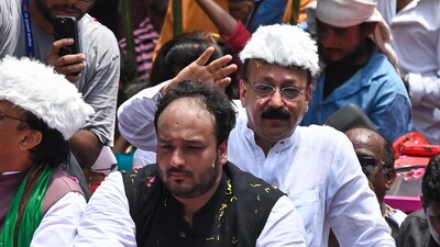 Bandra East MLA Zeeshan Siddique with his late father Baba Siddique in Mumbai. (Raju Shinde/ HT file) Bandra East MLA Zeeshan Siddique with his late father Baba Siddique in Mumbai. (Raju Shinde/ HT file)