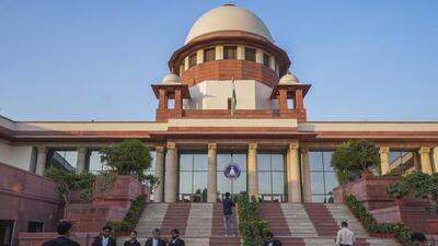 Lawyers at the Supreme Court complex in New Delhi (PTI FILE PHOTO) Lawyers at the Supreme Court complex in New Delhi (PTI FILE PHOTO)