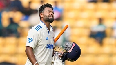 India's Rishabh Pant returns to pavilion after being dismissed by New Zealand's William O'Rourke on the fourth day of the first test cricket match between India and New Zealand, at the M Chinnaswamy Stadium, in Bengaluru (PTI) India's Rishabh Pant returns to pavilion after being dismissed by New Zealand's William O'Rourke on the fourth day of the first test cricket match between India and New Zealand, at the M Chinnaswamy Stadium, in Bengaluru (PTI)