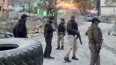 Security personnel cordon off the area after a terrorist attack, in Ganderbal district, (PTI) Security personnel cordon off the area after a terrorist attack, in Ganderbal district, (PTI)