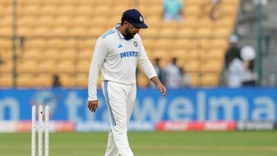 India's captain Rohit Sharma leaves the field after their loss against New Zealand on the day five of the first Test. (AP) India's captain Rohit Sharma leaves the field after their loss against New Zealand on the day five of the first Test. (AP)