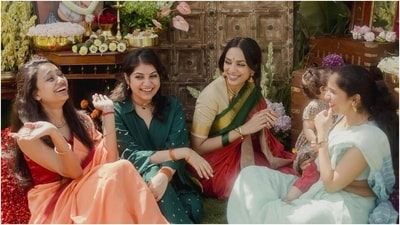 Sobhita also wore green bangles to complete the look. She tied her hair in a centre-parted, gajra-adorned hairdo. Lastly, for glam, she chose minimal makeup, including feathered brows, nude lips, mascara-adorned lashes, a red bindi, and blushed cheeks. Sobhita also wore green bangles to complete the look. She tied her hair in a centre-parted, gajra-adorned hairdo. Lastly, for glam, she chose minimal makeup, including feathered brows, nude lips, mascara-adorned lashes, a red bindi, and blushed cheeks. 