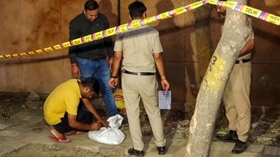 Forensic team collects samples from the site where a blast occured, near a CRPF school at Prashant Vihar, in Rohini. (PTI)