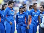 India's captain Harmanpreet Kaur, second right, and teammates react after their loss in the women's cricket T20 final match against Australia at Edgbaston at the Commonwealth Games 2022