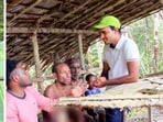 Travel vlogger Dheeraj Meena interacts with the Korowai tribe. Travel vlogger Dheeraj Meena interacts with the Korowai tribe.