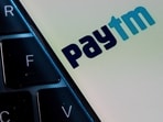 Paytm reported a net income of 9.3 billion rupees in Q3, driven by a gain from its events business sale. The fintech company faces regulatory hurdles and stiff competition in digital payments, prompting a strategic shift towards loans and payment services.