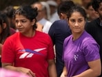 Wrestlers Vinesh Phogat and Sakshi Malik with supporters during their protest against Wrestling Federation of India (WFI) chief Brij Bhushan Sharan Singh.
