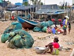 Fishing community in Puri prepares to leave the coast in preparations for Cyclone Dana