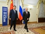 BRICS summit 2024 live:  Russian President Vladimir Putin and Chinese President Xi Jinping walk during a meeting on the sidelines of the BRICS Summit in Kazan, Russia October 22, 2024. 