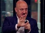 Anupam Kher recalled the incident about his car theft outside a temple when he was bankrupt.