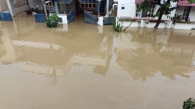 Severe flooding submerges half of a bungalow in Bengaluru, as relentless rainfall causes water to surge into homes, leaving residents stranded. (X/JDS)
