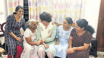 AICC general secretary Priyanka Gandhi Vadra meets a family in Wayanad, Kerala, on Tuesday. (PTI)