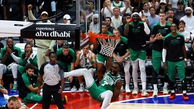 Boston Celtics' Jaylen Brown dunks the ball (REUTERS)