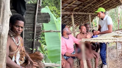 Travel vlogger Dheeraj Meena interacts with the Korowai tribe. (Instagram/ghoomtainsaan) Travel vlogger Dheeraj Meena interacts with the Korowai tribe. (Instagram/ghoomtainsaan)